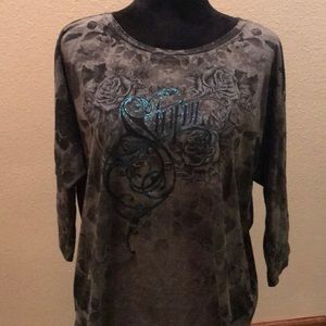 Sinful open lace back shirt